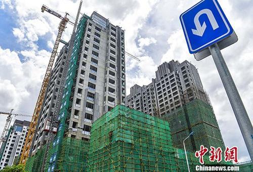 資料圖：正在建設(shè)的樓房。 <a target='_blank' href='http://www.chinanews.com/'>中新社</a>記者 駱云飛 攝